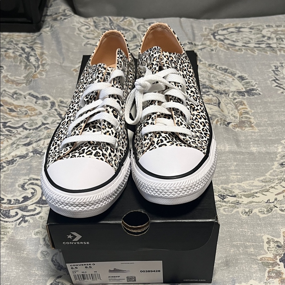 Converse Low Top Sneakers in White and Black Leopard Print